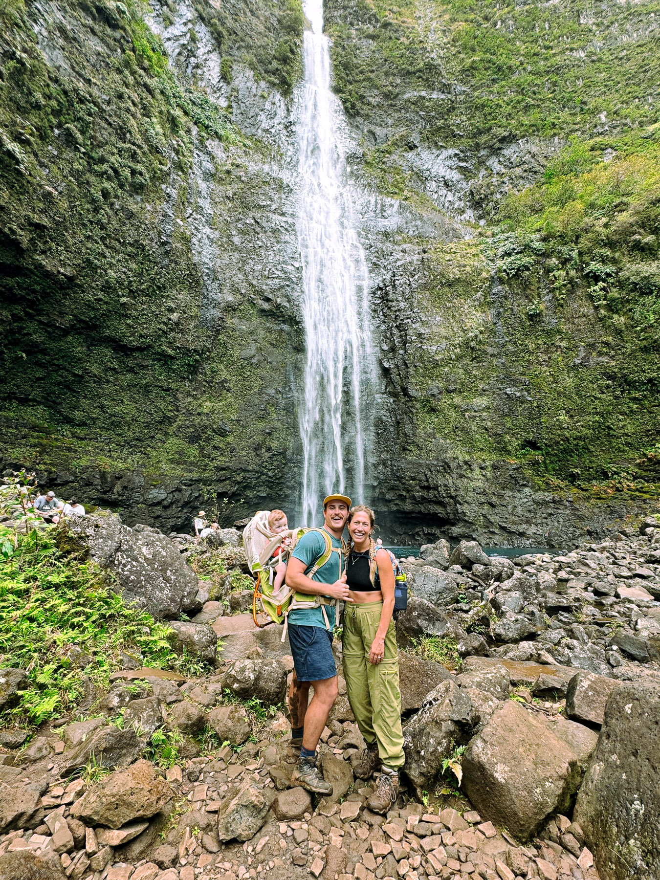 Family with Baby at Hanakapiai Falls in Kauai, Hawaii