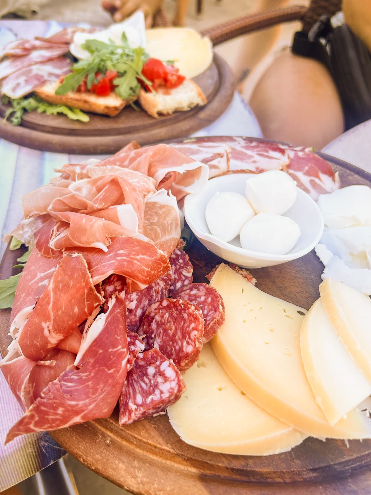 Charcuterie Board with traditional food of Puglia, Italy, Burrata Cheese in the middle at Carpenter Restaurant in Vieste, Puglia