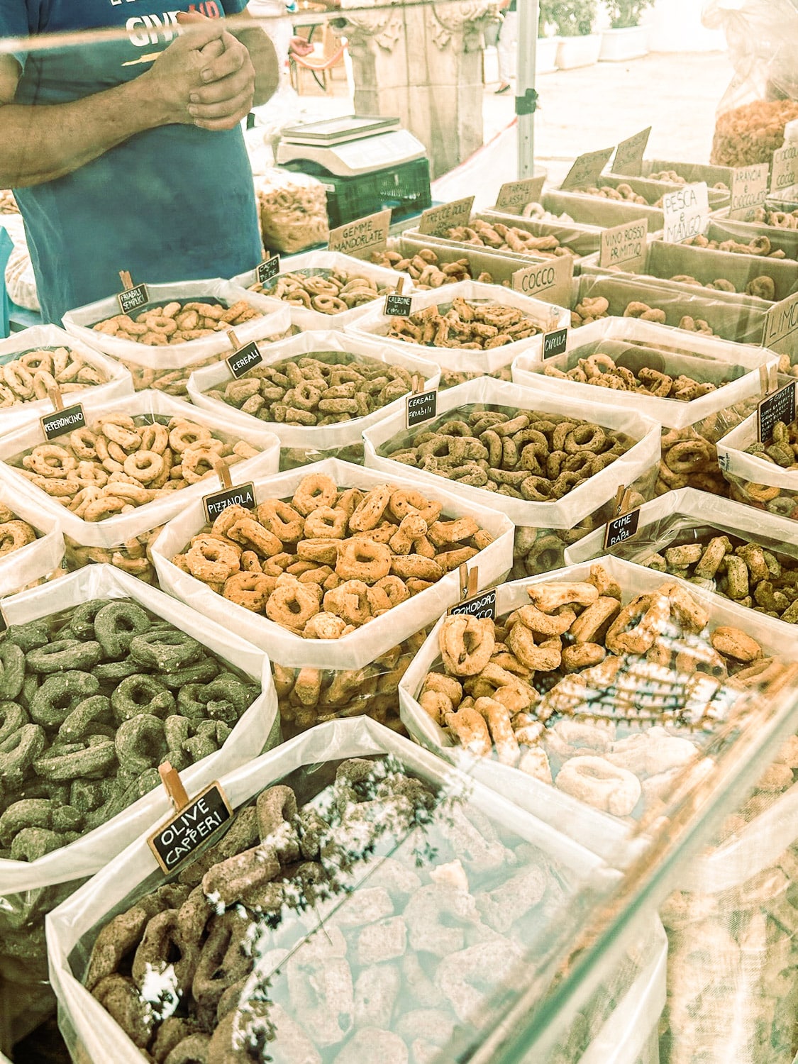 Bags of traditional food of Puglia, Italy, Taralli in different flavors at a roadside stand in Polignano a Mare in Puglia, Italy